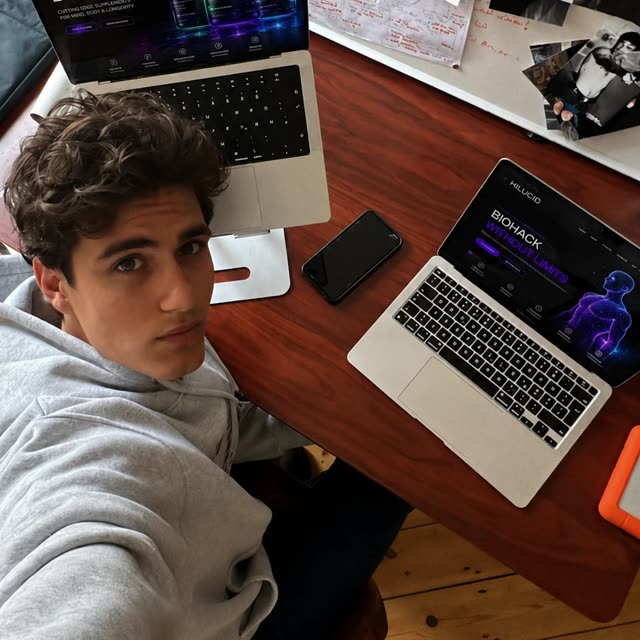 The Hilucid founder at his desk, the store open on his laptop