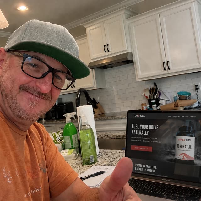 The TitanFuel founder with the store open on his laptop
